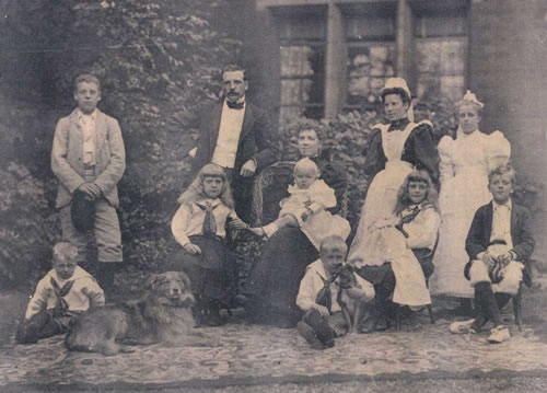 Sutton family photo outside their home in Dorking